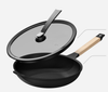 Wok en fonte