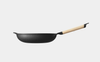 Wok en fonte